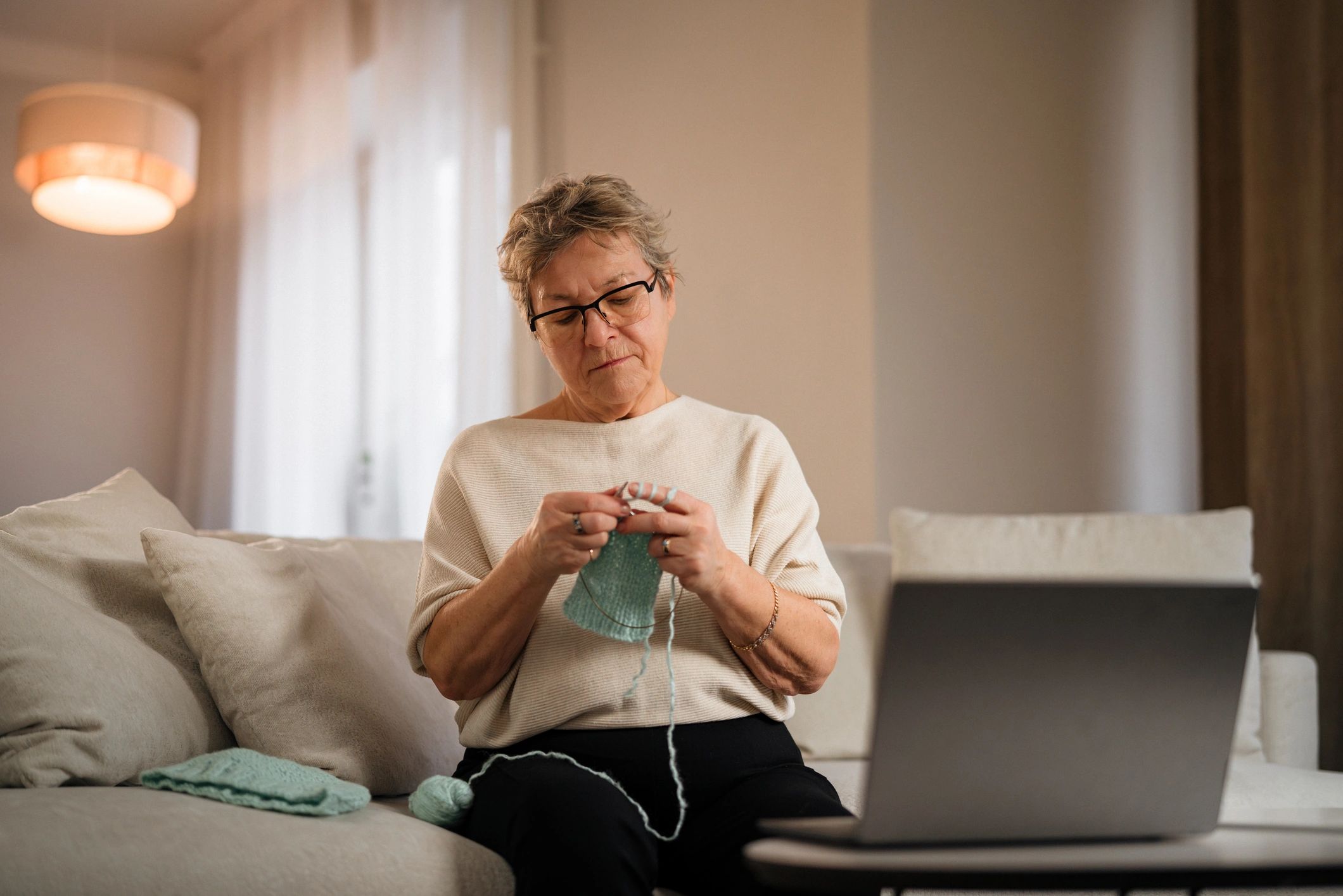 Smiling creative customer in a cozy home setting