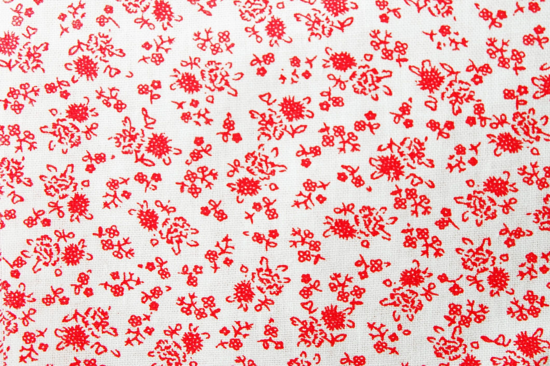 Delicate floral fabric pattern representing website use and policies